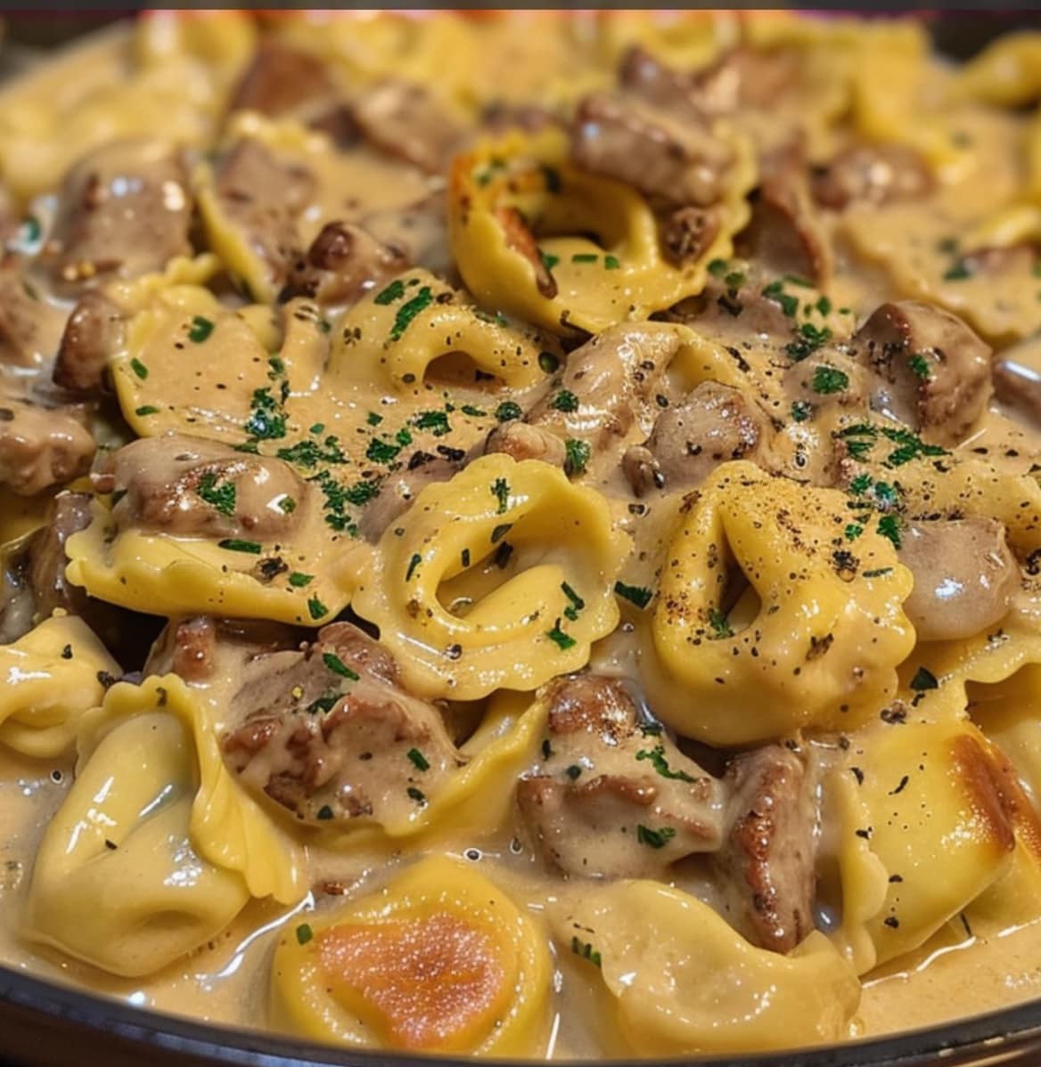 Cheese tortellini with rich provolone sauce