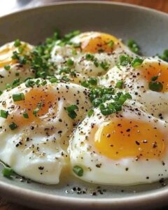 Poached Eggs with Fresh Herbs and Black Pepper